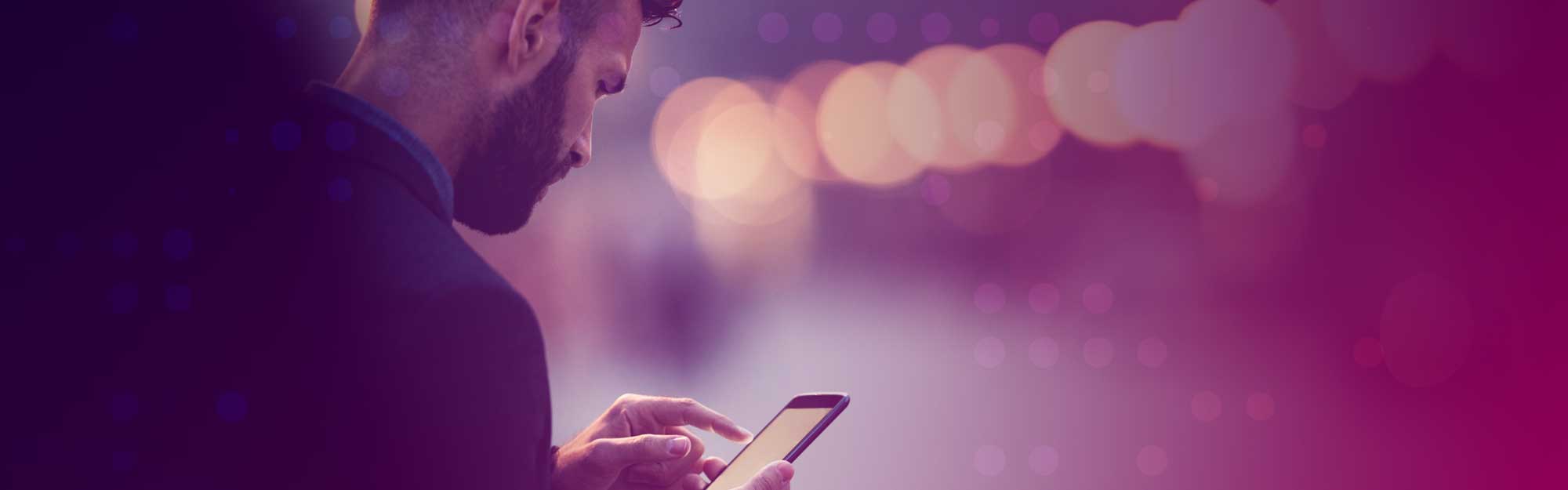 Businessman using mobile phone to access work IT system